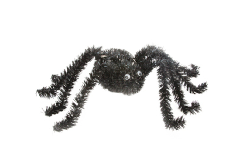 This black tinsel Halloween spider with googly eyes  can be put in any manner of positions around the home for the perfect Halloween fright. Perfect decoration for a Halloween party or to scare trick or treaters. Made by designer Gisela Graham.